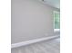 Neutral bedroom with a large window at 2106 Lacroix Way, Conyers, GA 30094