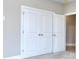 The bedroom has bi-fold doors on a closet at 2106 Lacroix Way, Conyers, GA 30094