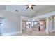 Modern kitchen with white cabinets, stainless steel appliances, and a center island at 2106 Lacroix Way, Conyers, GA 30094