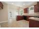 Spacious kitchen with ample counter space, well-lit and adjacent to a dining or breakfast area at 3606 High Battery Nw Blf, Acworth, GA 30101