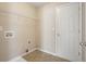 Laundry room with tile floor, shelving, and a door at 3606 High Battery Nw Blf, Acworth, GA 30101
