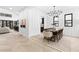 Elegant dining room with herringbone floors and modern chandelier at 904 Kings Cct Ne Ne, Atlanta, GA 30306