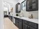 Sleek kitchen with dark cabinetry, quartz countertops, and wine cooler at 904 Kings Cct Ne Ne, Atlanta, GA 30306