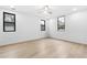 Bright bedroom featuring hardwood floors and large windows at 904 Kings Court Ne, Atlanta, GA 30306