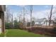 Landscaped backyard with wooden fence and stone pathway at 2733 Caldwell Rd, Brookhaven, GA 30319