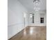 Bright dining room with hardwood floors and elegant chandelier at 2733 Caldwell Rd, Brookhaven, GA 30319