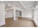 Spacious living room with hardwood floors and white walls at 2733 Caldwell Rd, Brookhaven, GA 30319