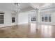 Spacious living room featuring hardwood floors and large windows at 2733 Caldwell Rd, Brookhaven, GA 30319