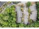 Aerial view of the townhome community highlighting the density of trees and rooftop views at 2927 Torreya Se Way, Marietta, GA 30067