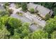 Aerial view of the multi Gathering residential dwelling showing the roof and the surrounding lush greenery at 2927 Torreya Se Way, Marietta, GA 30067