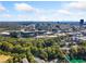 Scenic aerial view of the neighborhood with a stadium in the background and clear blue skies at 2927 Torreya Se Way, Marietta, GA 30067