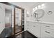 Stylish bathroom features a patterned tile floor and a spacious vanity with storage at 2927 Torreya Se Way, Marietta, GA 30067