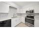 Modern kitchen featuring stainless steel appliances and white cabinets at 2927 Torreya Se Way, Marietta, GA 30067