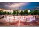 Olympic rings fountain at sunset in Atlanta's Olympic Park at 3268 Lions Ruby Ln, Atlanta, GA 30349