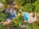 Aerial view showing community pool, landscaping, and pond at 918 Cannongate Sw Xing, Marietta, GA 30064