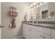 Clean bathroom with granite countertop and white cabinets at 918 Cannongate Sw Xing, Marietta, GA 30064