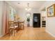 Small dining area with round table, chairs, and hardwood floors at 918 Cannongate Sw Xing, Marietta, GA 30064