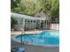 Community pool with gazebo and surrounding landscaping at 918 Cannongate Sw Xing, Marietta, GA 30064