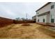 Spacious backyard featuring a tree, lawn, and a wood fence, great for outdoor activities and privacy at 3004 Amabile Rd, Dacula, GA 30019