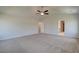 Large bedroom featuring vaulted ceiling, ceiling fan and access to bathroom and closet at 3004 Amabile Rd, Dacula, GA 30019