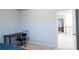 Bedroom with a dark desk and chair overlooking the upstairs hallway and staircase at 3004 Amabile Rd, Dacula, GA 30019