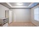 Bedroom with neutral color palette, plush carpet, closet and window at 3004 Amabile Rd, Dacula, GA 30019