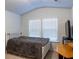 Bedroom with large windows, neutral carpet, and vaulted ceilings at 3004 Amabile Rd, Dacula, GA 30019