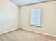 Spacious bedroom with neutral walls, carpet, and a window at 3004 Amabile Rd, Dacula, GA 30019