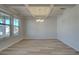Bright dining room with coffered ceilings and hardwood floors at 3004 Amabile Rd, Dacula, GA 30019