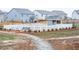 Community dog park featuring a fenced-in area, walking path and benches at 3004 Amabile Rd, Dacula, GA 30019