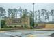 A stone entrance sign welcomes you to the Adagio community at 3004 Amabile Rd, Dacula, GA 30019