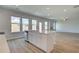 Spacious open floorplan with large kitchen island and stainless appliances at 3004 Amabile Rd, Dacula, GA 30019