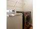 Laundry room featuring new front load washer and dryer at 3004 Amabile Rd, Dacula, GA 30019