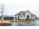 Community mailboxes and community center in an attractive grey stone and grey siding building at 3004 Amabile Rd, Dacula, GA 30019