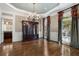 Elegant dining room features hardwood floors and a chandelier at 1446 W Wesley Nw Rd, Atlanta, GA 30327