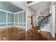 Elegant entryway with hardwood floors and a grand staircase at 1446 W Wesley Nw Rd, Atlanta, GA 30327