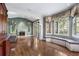 Gathering room featuring hardwood floors and a fireplace at 1446 W Wesley Nw Rd, Atlanta, GA 30327