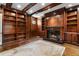 Study with hardwood floors, built-in bookshelves and fireplace at 1446 W Wesley Nw Rd, Atlanta, GA 30327