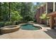 Stunning pool and spa surrounded by mature trees at 1446 W Wesley Nw Rd, Atlanta, GA 30327