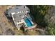 Aerial view showcasing home's expansive backyard and pool at 1500 W Wesley Nw Rd, Atlanta, GA 30327