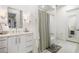 Clean bathroom with shower/tub combo and modern vanity at 1500 W Wesley Nw Rd, Atlanta, GA 30327