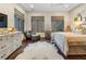 Bright bedroom with hardwood floors and large windows at 1500 W Wesley Nw Rd, Atlanta, GA 30327