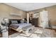 Large bedroom with hardwood floors and en-suite bathroom at 1500 W Wesley Nw Rd, Atlanta, GA 30327