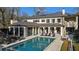 Inviting pool area with ample lounge chairs and patio furniture at 1500 W Wesley Nw Rd, Atlanta, GA 30327