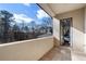 Peaceful private balcony offering scenic wooded views and interior access at 1500 W Wesley Nw Rd, Atlanta, GA 30327