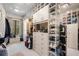 Large walk-in closet with ample shelving and drawers for clothing and shoes at 1500 W Wesley Nw Rd, Atlanta, GA 30327