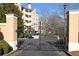 Elegant gated entrance to the community with holiday wreaths and manicured landscaping at 234 Ashford Cir, Atlanta, GA 30338