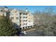 Exterior view of Ashford Condominiums building with balconies at 234 Ashford Cir, Atlanta, GA 30338