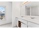 Bathroom with double vanity and large mirror at 283 Boulder Park Ln, Atlanta, GA 30331