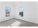 Spacious bedroom with neutral carpeting and large windows at 283 Boulder Park Ln, Atlanta, GA 30331